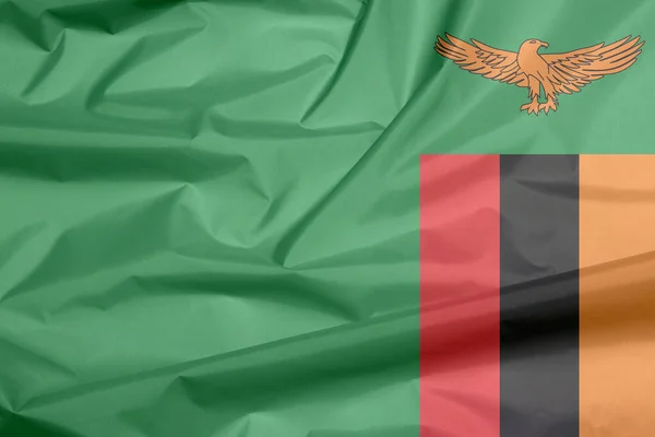 Флаг Замбии Складка Фона Флага Замбии Зеленое Поле Орлом Оранжевого — стоковое фото
