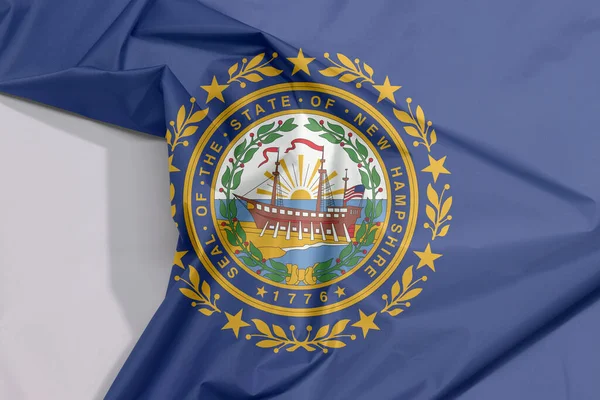 New Hampshire fabric flag crepe and crease with white space, the states of America. The State Seal of New Hampshire on a blue field surrounded by Laural leaves and nine stars.