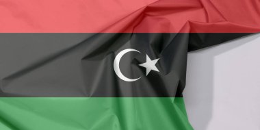 Libya bayraklı krep ve kat kat beyaz alan, kırmızı siyah ve yeşil beyaz hilal ve yıldız. 
