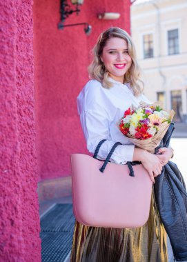 Concept of life modern woman in big city, lifestyle citizen peoples, lady at spring or autumn day. Middle age woman plus size , walk around center streets