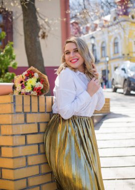 Concept of life modern woman in big city, lifestyle citizen peoples, lady at spring or autumn day. Middle age woman plus size , walk around center streets