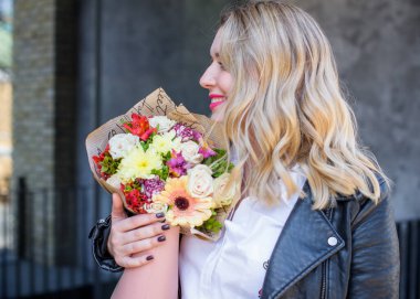 Concept of life modern woman in big city, lifestyle citizen peoples, lady at spring or autumn day. Middle age woman plus size , walk around center streets