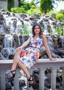 Hispanic pretty young woman rest at summer time. Latina Woman relax at nature and enjoy the life