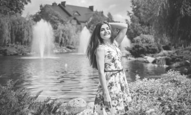 Hispanic pretty young woman rest at summer time. Latina Woman relax at nature and enjoy the life