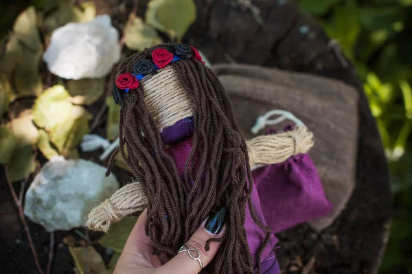 Magic handmade doll .Witchcraft with a doll. Concept of magic, voodoo