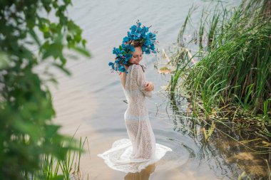 Bride nymph at water, Slavic rituals, pagan magic scene, nature power concept