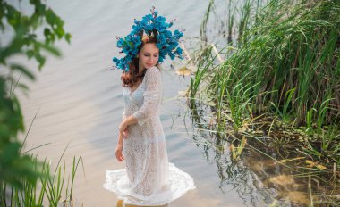 Bride nymph at water, Slavic rituals, pagan magic scene, nature power concept
