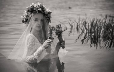 Bride nymph at water, Slavic rituals, pagan magic scene, nature power concept