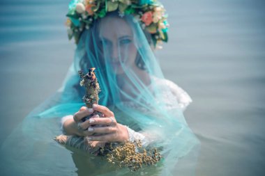 Bride nymph at water, Slavic rituals, pagan magic scene, nature power concept