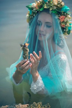 Bride nymph at water, Slavic rituals, pagan magic scene, nature power concept