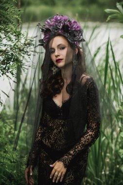 Black bride at water, Slavic rituals, pagan magic scene, old magic power concept