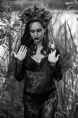 Black bride at water, Slavic rituals, pagan magic scene, old magic power concept