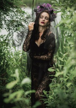 Black bride at water, Slavic rituals, pagan magic scene, old magic power concept