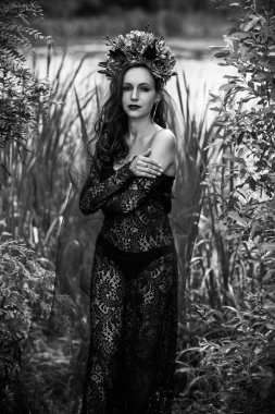 Black bride at water, Slavic rituals, pagan magic scene, old magic power concept