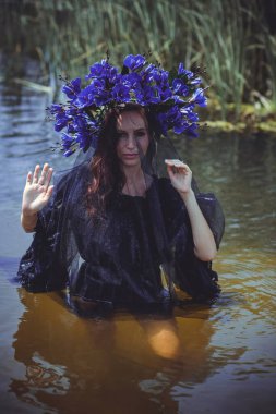 Black bride at water, Slavic rituals, pagan magic scene, old magic power concept