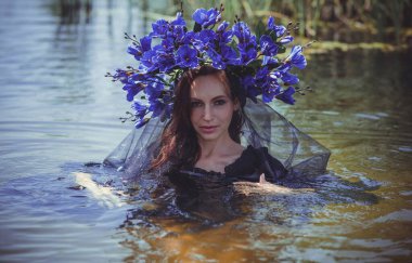 Black bride at water, Slavic rituals, pagan magic scene, old magic power concept