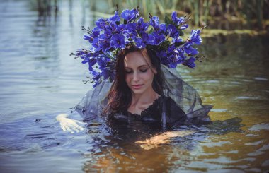 Black bride at water, Slavic rituals, pagan magic scene, old magic power concept