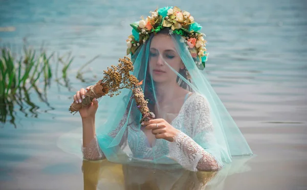 Bride nymph at water, Slavic rituals, pagan magic scene, nature power concept