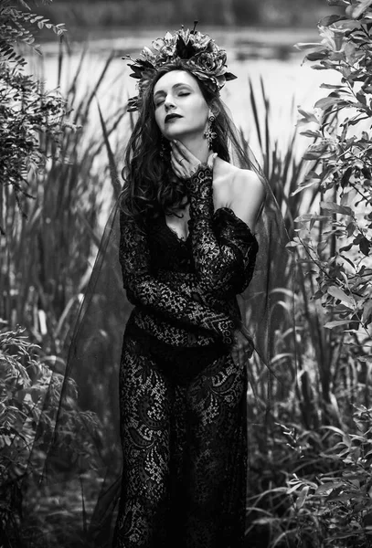 Black bride at water, Slavic rituals, pagan magic scene, old magic power concept