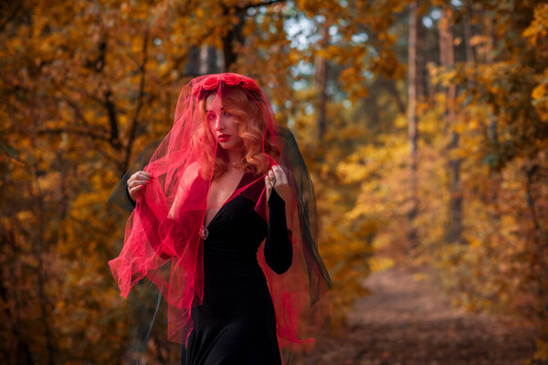 Magical time, Autumn bride with red veil . Costume and ideas for party, lady's witchcraft