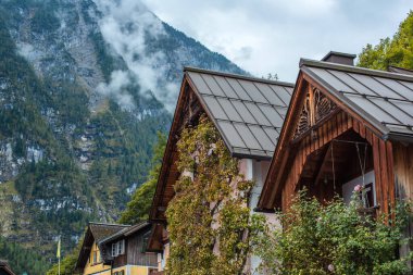 Hallstatt Village, Austria. Scenic Alpine Landscape with Traditional Houses and Calm Water Reflections