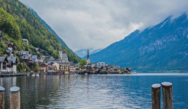 Hallstatt Village, Austria. Scenic Alpine Landscape with Traditional Houses and Calm Water Reflections