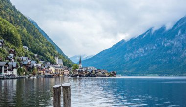 Hallstatt Village, Austria. Scenic Alpine Landscape with Traditional Houses and Calm Water Reflections