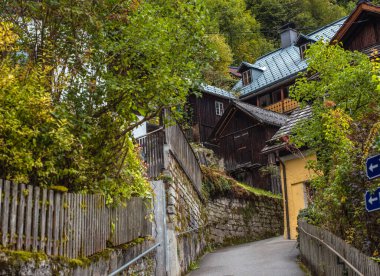 Hallstatt Village, Austria. Scenic Alpine Landscape with Traditional Houses and Calm Water Reflections