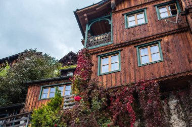 Hallstatt Village, Austria. Scenic Alpine Landscape with Traditional Houses and Calm Water Reflections