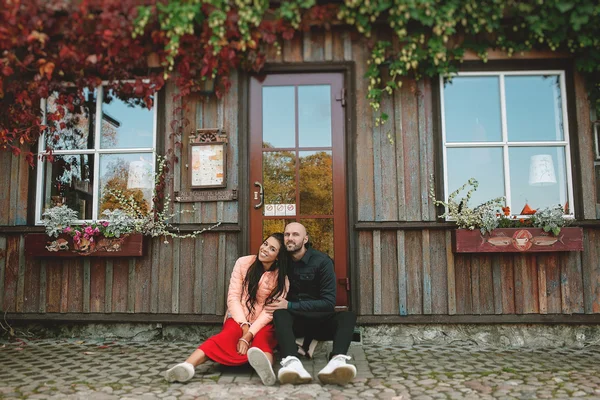 Couple sitting near restaurant in a good mood — Stock Photo, Image