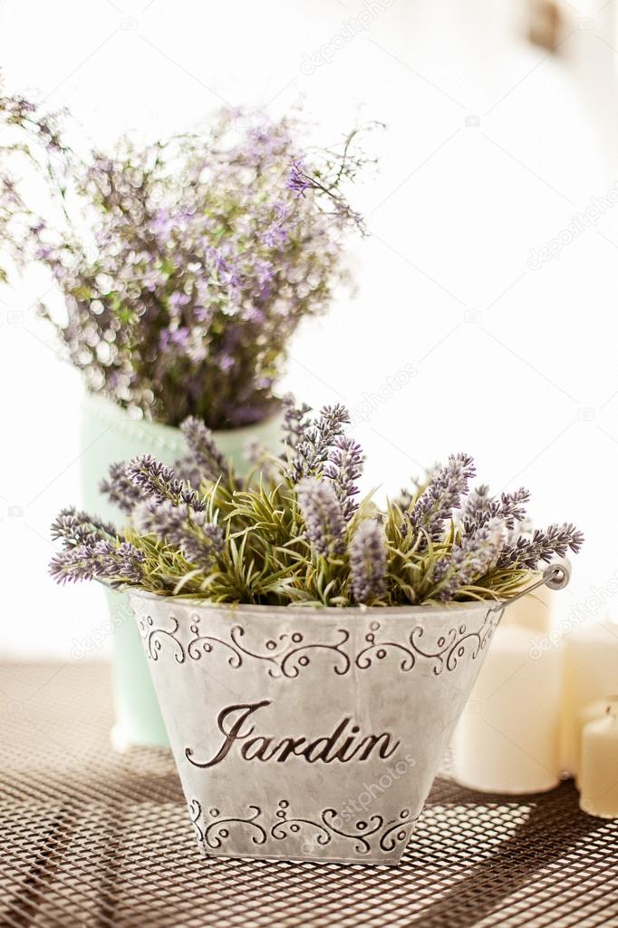 Spring flowers in a vase on table