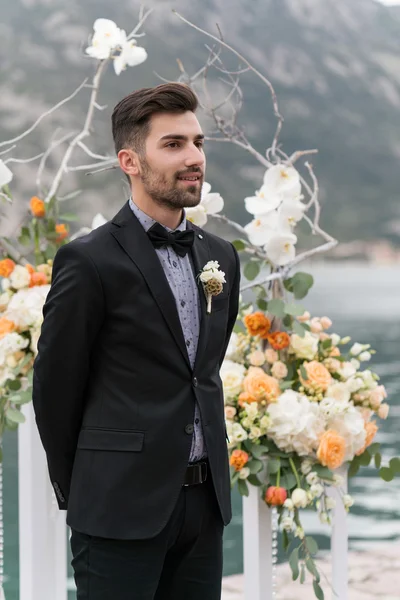 Sexy man in tuxedo posing — Stock Photo, Image