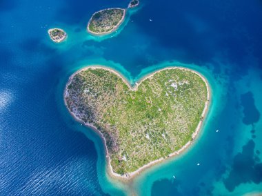 Aerial view of the heart shaped Galesnjak island on the adriatic coast. clipart