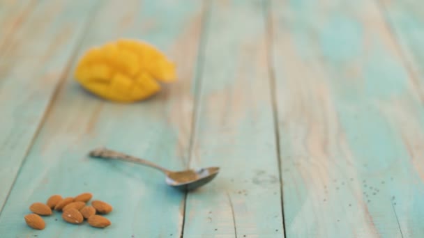 Chia seed pudding with mango and almond — Stock Video