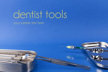 dentist tools on a blue clipart