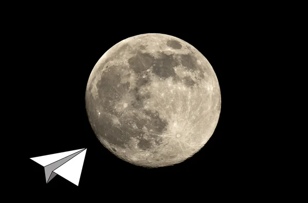 Paper plane flying to the moon — Stock Photo, Image
