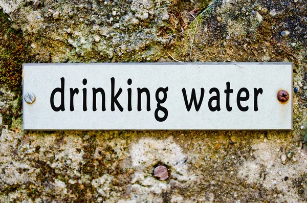 Etiqueta de metal agua pública —  Fotos de Stock