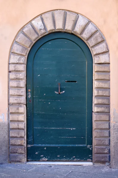 Ancient wooden door of historic building — Stock Photo, Image