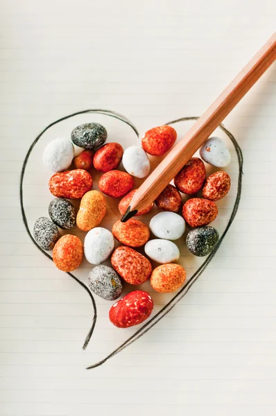 Heart, stones and pencil — Stock Photo, Image