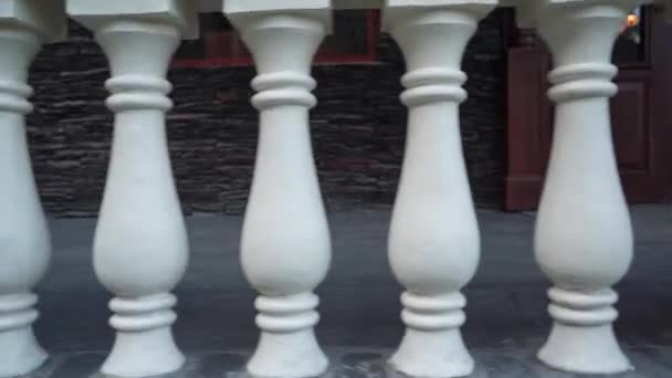 White Balusters At The Terrace Of A Contemporary Hotel - fast tracking shot — Stock Video