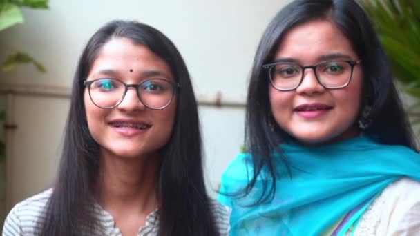 Smiling Teenage Girls With Glasses Looking At Camera In Agra India - medium shot — Stock Video