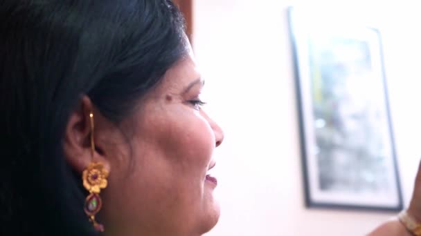 Mother Happily Talking To Her Daughter Through Video Call On Smartphone During Diwali Festivity In Agra, India - close up, reveal shot — Stock Video