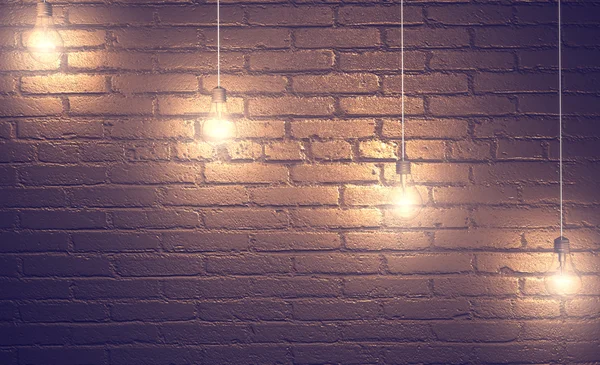 Brick wall with bulbs — Stock Photo, Image