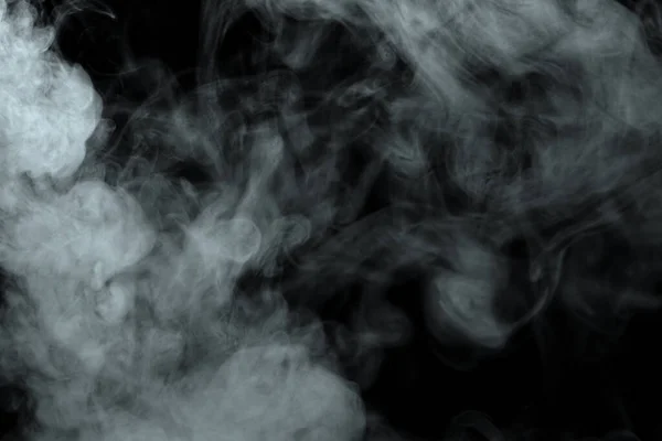 在黑色背景上分离的粉末或烟雾效果 — 图库照片