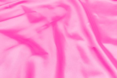 Plastik pembe saten kumaş dokusu yumuşak bulanık arkaplan
