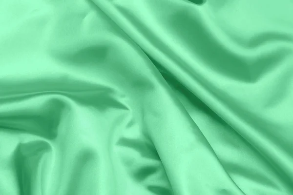 Zöld Szatén Szövet Textúra Puha Elmosódott Háttér — Stock Fotó