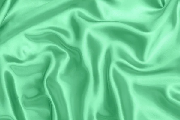 Yeşil Saten Kumaş Dokusu Yumuşak Bulanık Arkaplan — Stok fotoğraf