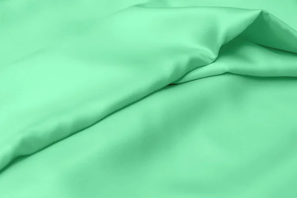 Green Satin Fabric Texture Soft Blur Background — Stock Photo, Image