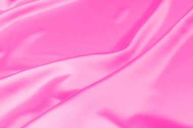 Plastik pembe saten kumaş dokusu yumuşak bulanık arkaplan