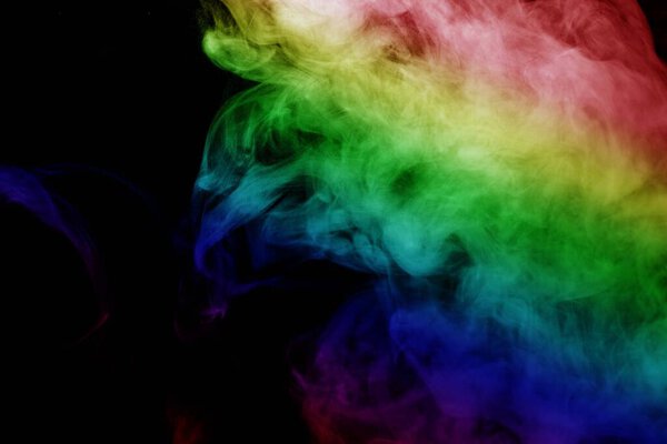 Abstract colorful smoke isolated on black background,Rainbow powder